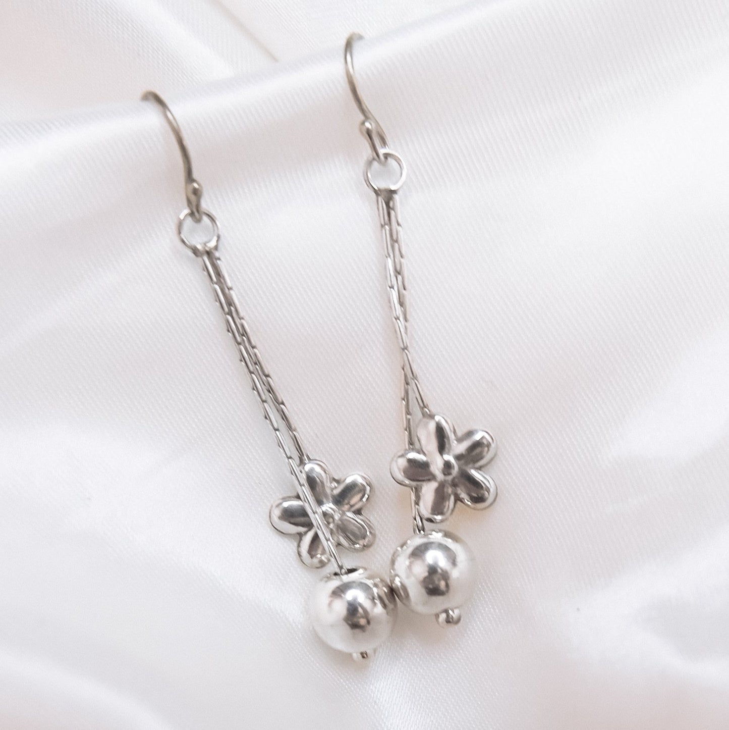 Silver Bloom – Petite Floral Drop Earrings